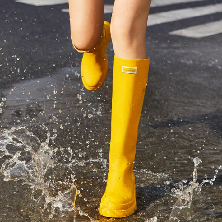 Botas de lluvia altas antideslizantes e impermeables de moda